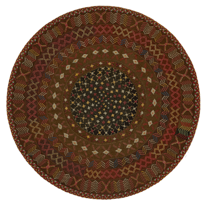 A round rug with a colorful design on it.