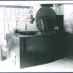 An old black and white photo of a stove.