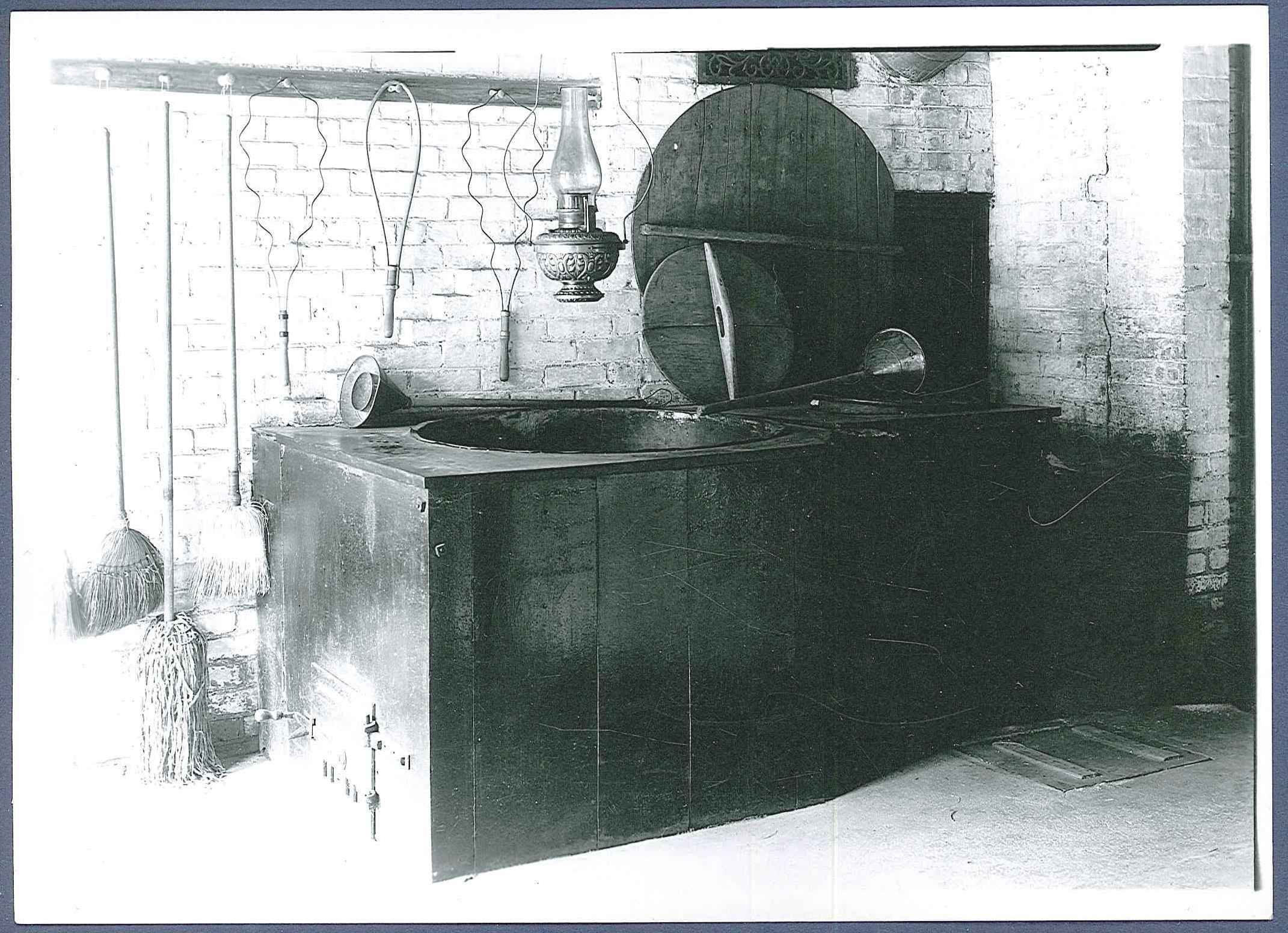 An old black and white photo of a stove.
