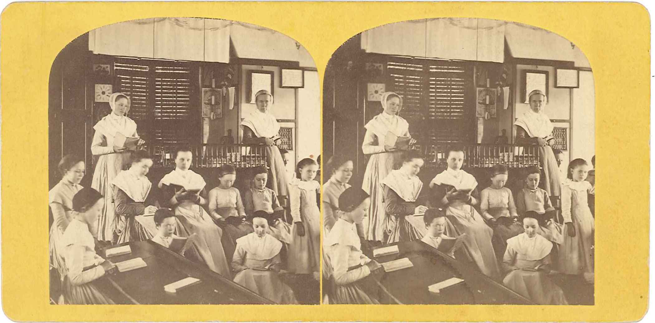 A photo of a group of women in a classroom.