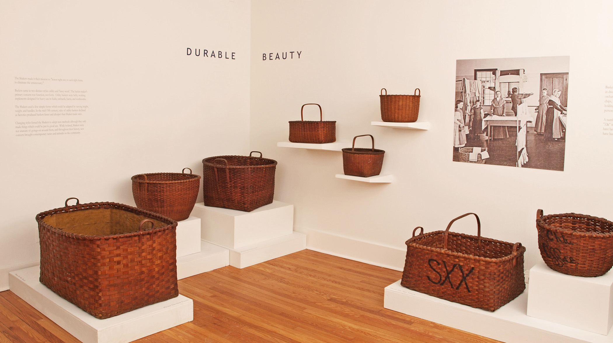 A collection of baskets on display in a museum.
