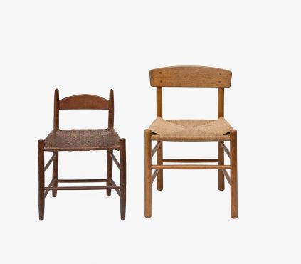 Two wooden chairs on a white background.