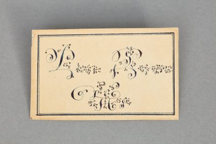 A book with a calligraphy on the cover.