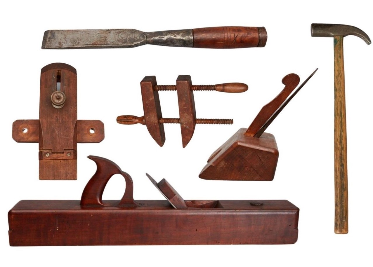 A group of woodworking tools on a white background.