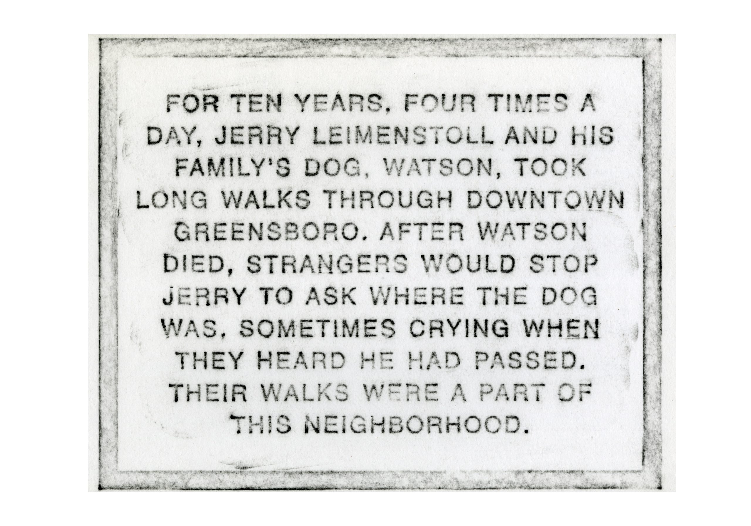 Plaque detailing the community impact of jerry leimenstoll's daily walks with his dog, watson, through downtown greensboro and the neighborhood's reaction to the dog's passing.